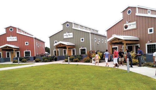 AAWE conference attendees visit winery and brewery incubators at the Walla Walla Airport.##Photo by Orley Ashenfelter