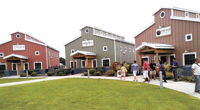 AAWE conference attendees visit winery and brewery incubators at the Walla Walla Airport.##Photo by Orley Ashenfelter AAWE conference attendees visit winery and brewery incubators at the Walla Walla Airport.##Photo by Orley Ashenfelter
