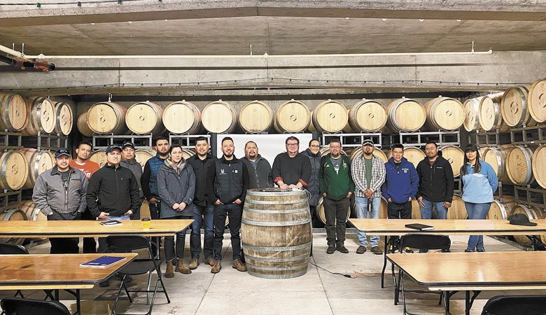 From left: Omar Garcia; Omar Chavez, Hawks View vineyard supervisor; Natividad Ramos; Marco Coronado; Alejandro;  Moreno Velador; DeAnna Ornelas, AHIVOY president; Daniel Barajas; Alejandro Avalos Corona; Miguel Angel Azua; Don Crank, Hawks View Winery winemaker and AHIVOY instructor; Elizabeth Cryan, Spanish support facilitator; Sergio Reyes; Adrian Mendoza; Ben Hernandez; José Martinez Lopez; Elena Rodriguez, AHIVOY education committee member. ##Photo provided