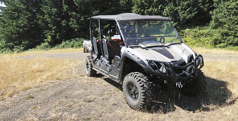 A WillaKenzie ATV rests while guests check out vines and wines. ##Photo by Valerie E. Rogers