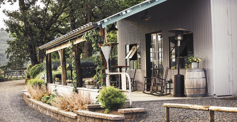 Abbey Road Farm’s new tasting room nestles under towering oaks on the sprawling property; guests can taste a number of brands inside. ##Photo by Kathryn Elsesser