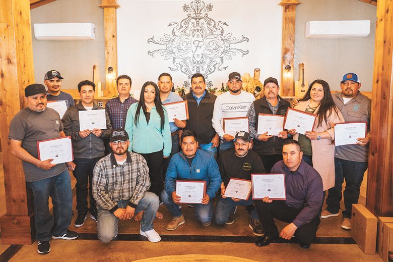 The fourth cohort of Asociación Hispana de la Industria del Vino en Oregon y Comunidad / Hispanic Association of the Wine Industry in Oregon and the Community, or AHIVOY, graduates. ##Photo by Sean Carr Photography