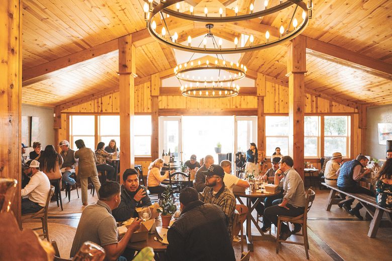 AHIVOY graduates celebrating with their family and friends at The Four Graces Winery.##Photo by Sean Carr Photography