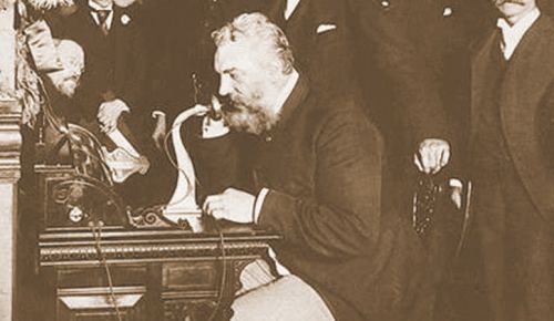Alexander Graham Bell calls his momma — I'm assuming — on the device he invented in 1876. ##Photo courtesy of the Library of Congress