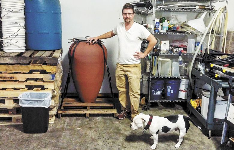 Winemaker Alex Neely of Libertine Wines with his friend, Jerry. ##Photo by Michael Alberty