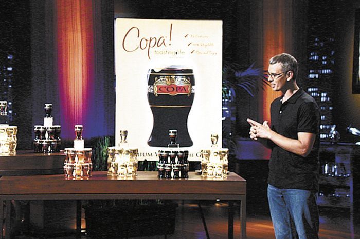 James Martin presents his business venture, Copa Di Vino, to judges on the ABC TV show “Shark Tank.”