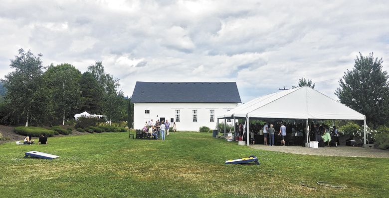 Guests gather at the inaugural
Alt Wine Fest at the Old Schoolhouse outside Newberg. ##Photo by Mark Stock