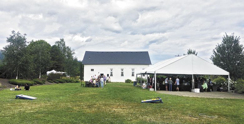 Guests gather at the inaugural
Alt Wine Fest at the Old Schoolhouse outside Newberg. ##Photo by Mark Stock