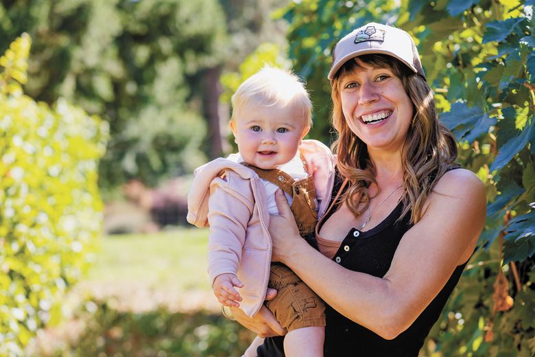 Amy Jay, vineyard manager, regenerative farmer/consultant and aspiring winemaker with baby Avery.##Photo by Molly Bermea Amy Jay, vineyard manager, regenerative farmer/consultant and aspiring winemaker with baby Avery.##Photo by Molly Bermea