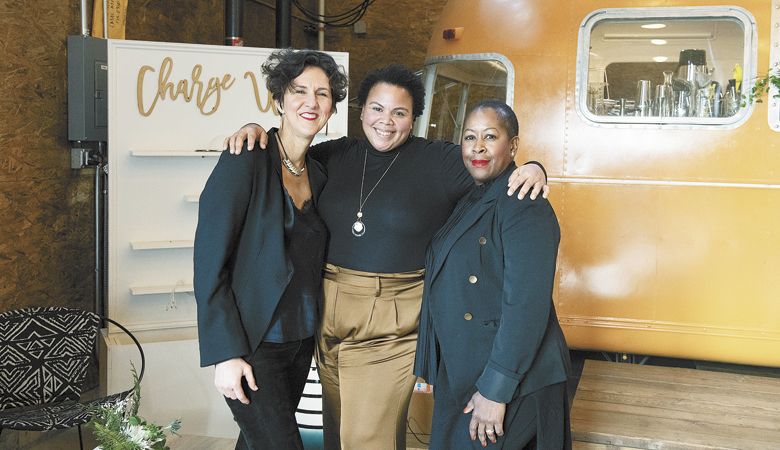 Elaine Chukan Brown (from left), journalist for
Jancis Robinson; Chevonne Ball, owner of the Dirty Radish;
and Julia Coney, D.C.-based wine journalist.
14. ##Photo by Carolyn Wells-Kramer