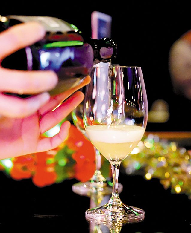 A glass of sparkling wine at the Barrel Full of Money auction. The month-long campaign, organized by Walla Walla Valley Wine, has raised over $700,000 in 14 years for the region s Blue Mountain Action Council, helping families dealing with poverty. ## Photo by Jason Mulkin