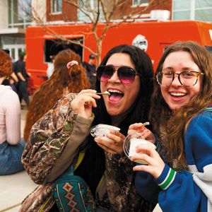 Two OSU students enjoying scoops of ice cream on the Corvallis creamery s opening day. ## Photo provided by OSU College of Agricultural Sciences