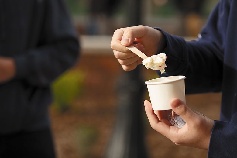 Student eating ice cream on opening day of OSU s new The Beaver Classic Creamery. ## Photo provided by OSU College of Agricultural Sciences