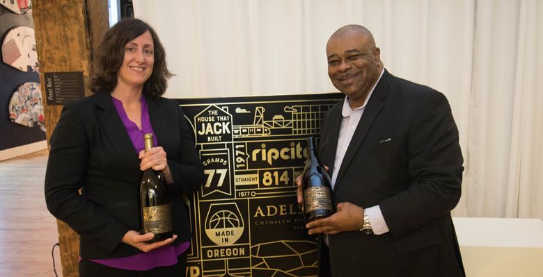 Adelsheim winemaker Gina Hennen with Michael Lewellen, Blazers vice president of corporate communications, during the label unveiling. ##Photo provided