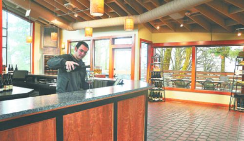 Eddie Zavestoski, a Sokol Blosser tasting room associate, works in the renovated space. Photo provided. Eddie Zavestoski, a Sokol Blosser tasting room associate, works in the renovated space. Photo provided.