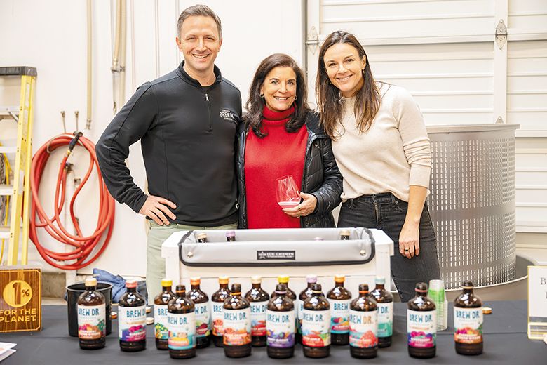 The first Sip & Savor event at Brooks Wine. From left: Matt Thomas, founder and brewer at Brew Dr. Kombucha standing with Janie Brooks Heuck, Brooks Wine s managing director and Jen Cossey, Brooks  general manager. ## Photo provided by Brooks Wine