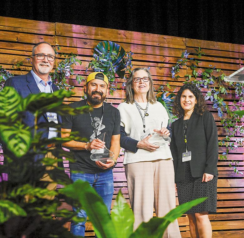 Oregon Wine Board staff and members with this year s Oregon Wine Symposium awardees. From left to right: Dr. Greg Jones, board chair of Oregon Wine Board, wine climatologist and Abacela s CEO; Miguel Lopez, founder and owner of Red Dirt Vineyard Management; Monica Wright, Jerry McGinn s spouse accepting the posthumous award on his behalf; Gina Bianco, Oregon Wine Board s executive director. ##Photo by Carolyn Wells-Kramer