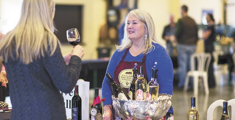 : Members of the Cascade Foothills Winegrowers gather at Hanson Vineyards in Woodburn. ##Photo Provided