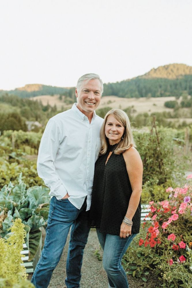Chris and Melissa Thomas, owners of Celestial Hill Vineyard, live on the property and are seen here in their garden. ##Photo provided by Celestial Hill Vineyard