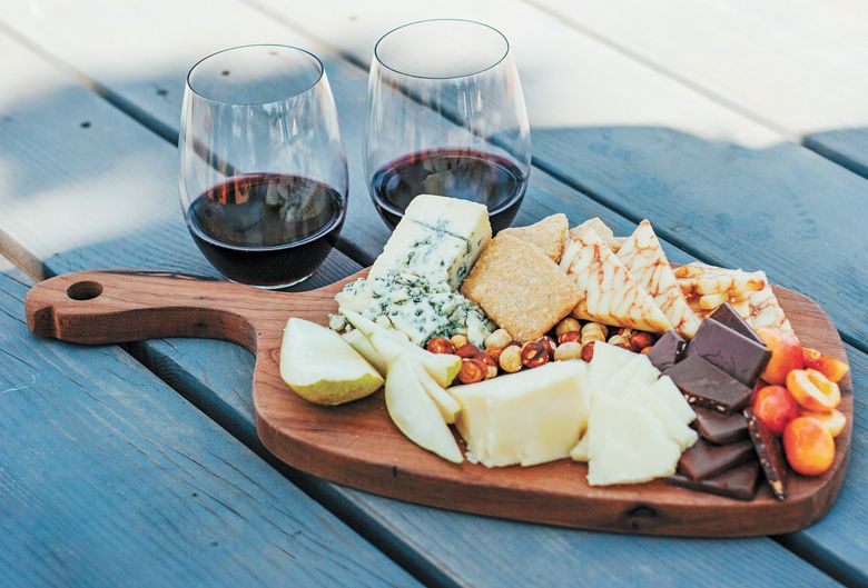 A selection of Rogue Creamery cheese paired with crackers, chocolate and fresh fruit. ##Photo provided by Rogue Creamery