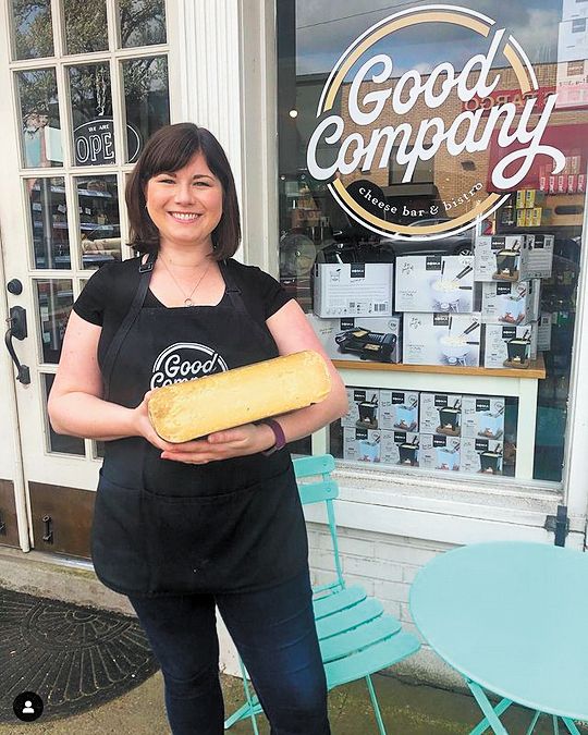 Kristen Kidney, owner of Good Company Cheese Bar & Bistro in Newberg, holding a wheel of aged goat Gouda.##Photo credit: Good Company Cheese Bar & Bistro Kristen Kidney, owner of Good Company Cheese Bar & Bistro in Newberg, holding a wheel of aged goat Gouda.##Photo credit: Good Company Cheese Bar & Bistro