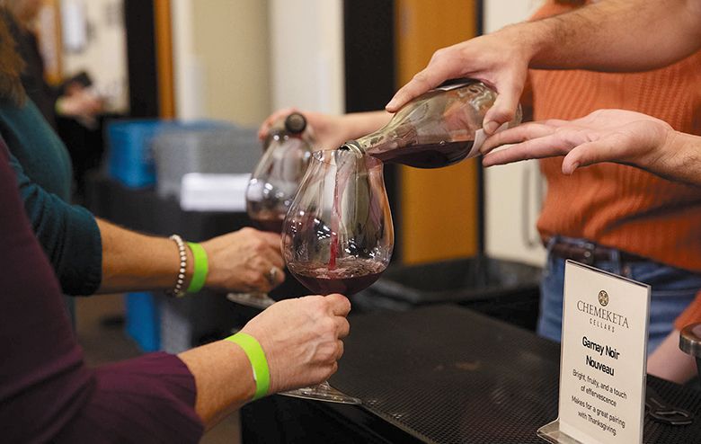 Attendees receiving wine samples during the Nouveau Release Party, held at Chemeketa Eola s Northwest Wine Studies Center. ## Photo provided by Chemeketa Community College
