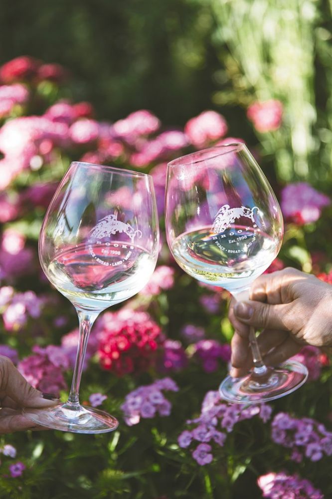 Glasses filled with Brooks white wine clicked in a cheers. ## Photo by Cheryl Juetten