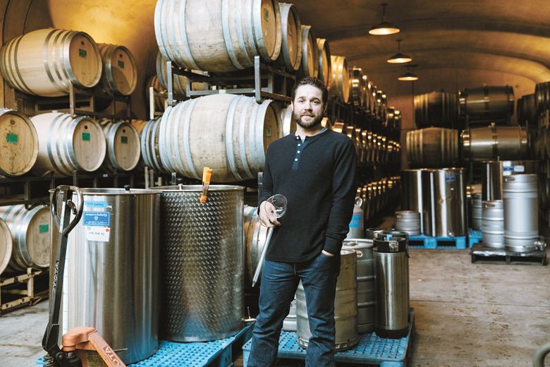 In the cellar with Soter Vineyards’ winemaker Chris Fladwood. ##Photo By Cheryl Juetten
