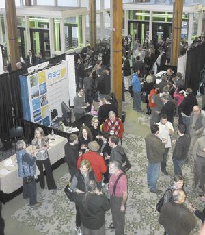Wine industry members mingle at the 2011 Oregon Wine Symposium at the Eugene Hilton and Hult Center. Wine industry members mingle at the 2011 Oregon Wine Symposium at the Eugene Hilton and Hult Center.