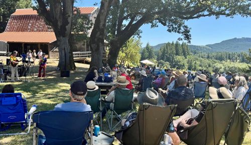 Summer concert at Lumos Wine Company. ## Photo by Gail Oberst