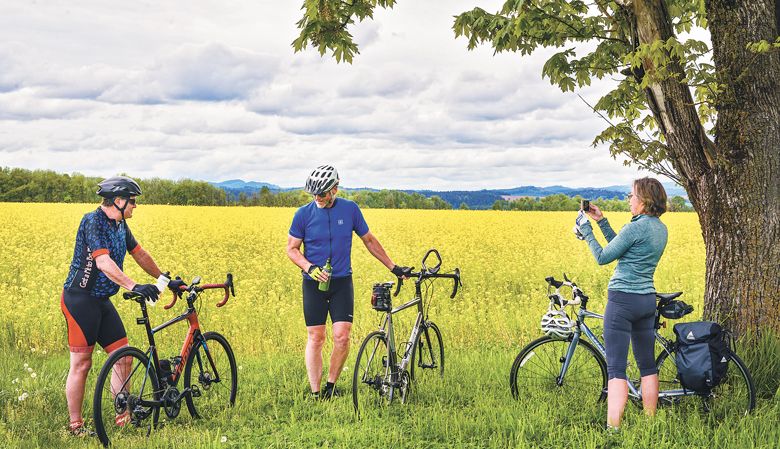 Friends pose for a photo before starting their wine country ride. ##Melanie Griffin/www.eugenecascadescoast.org