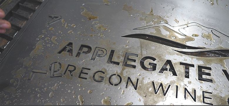 Creating new signage for the Applegate Valley Vintners. ## Photo by Trish Glose