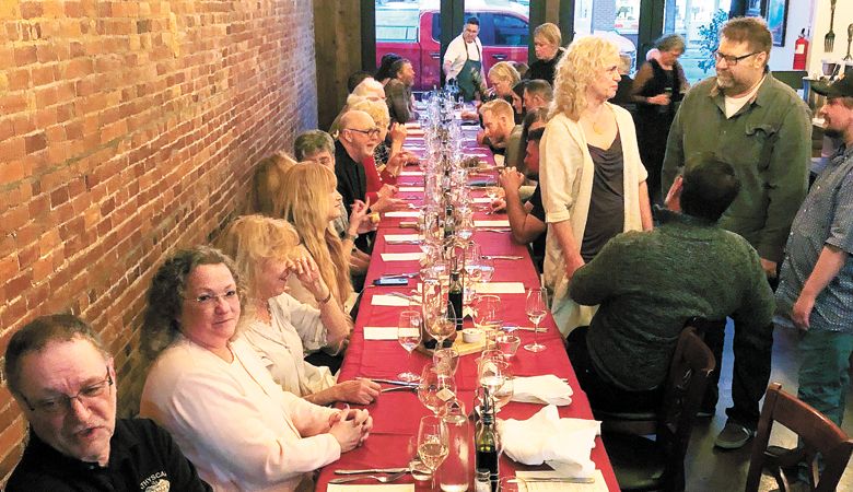 Guests mingle at the dinner and auction fundraiser for Earl Cramer-Brown’s kidney transplant medical fund. The dinner was hosted at Rosmarino Osteria Italiana in Newberg. ##Photo provided