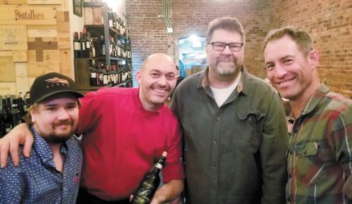 (From left) Earl Cramer-Brown’s son, Cooper; Rosmarino owner/chef Dario Pisoni; Earl, himself; and winemaker Jesse Lange of Lange Estate. ##Photo provided
