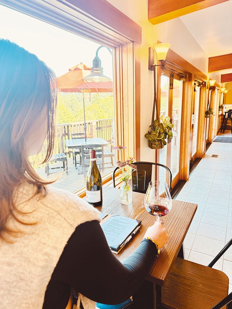 A woman tasting wine at Elk Cove Vineyards. ## Photo by Luis Romero