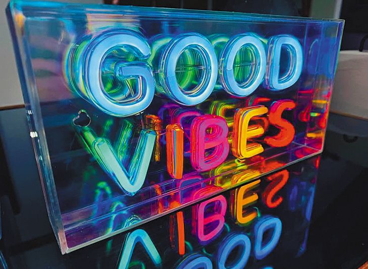Eternal Wines promises  good vibes  with it s neon sign. ## Photo by Savahnna Marie