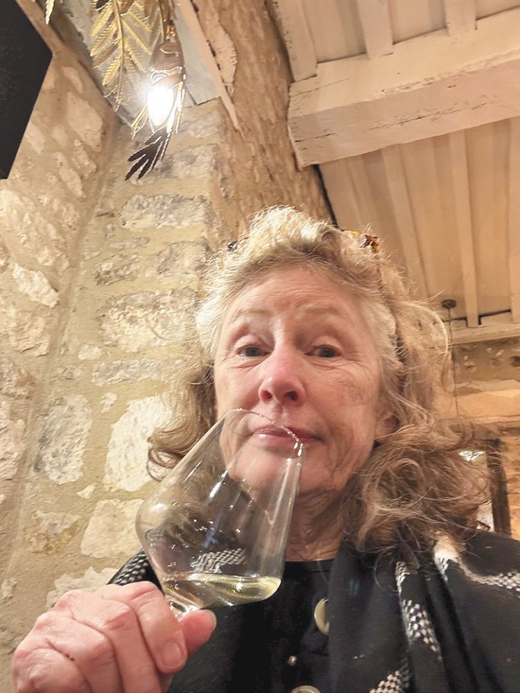 Jackson Family Wines&rsquo; senior vice president of winegrowing, Eugenia Keegan, sipping white wine in a French cellar. ## Photo provided by Eugenia Keegan