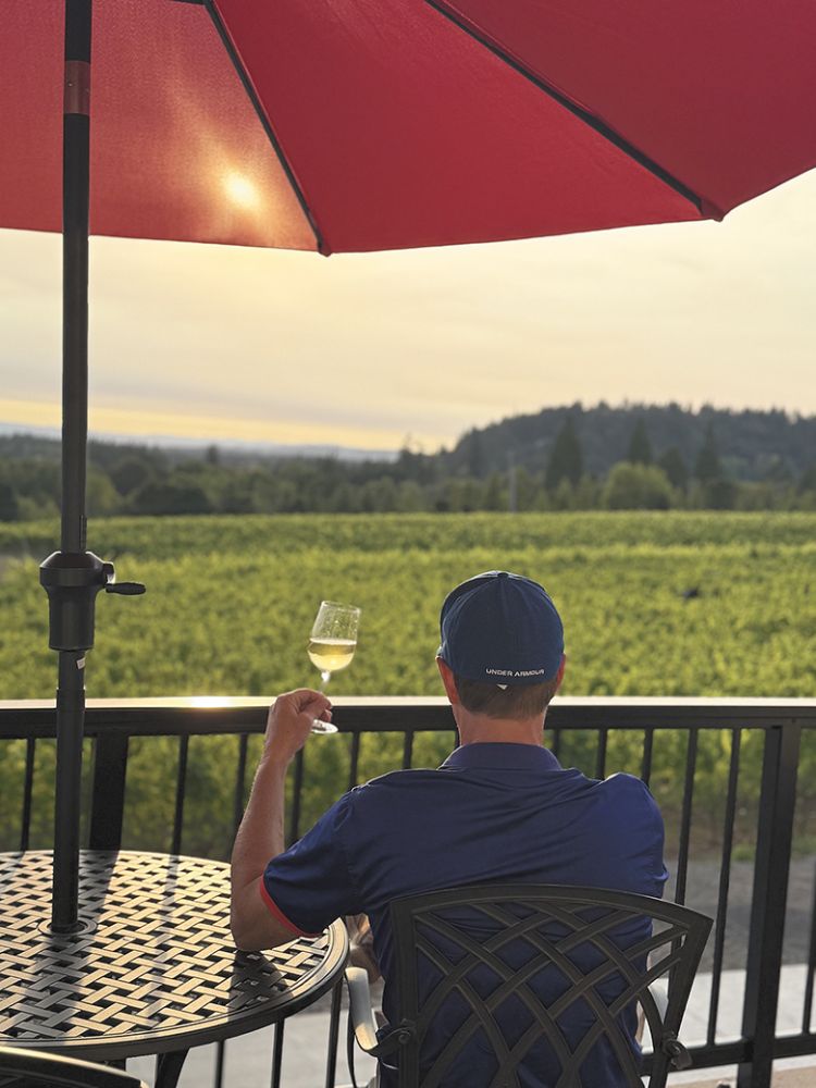 A person drinking a glass of wine on Festive Hill s deck. ## Photo provided by Festive Hill Winery