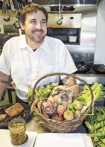 Chef/Co-owner Paul Bachand of Recipe in Newberg sources meat and produce for the 10-Mile Dinner hosted at his restaurant. Photo by Andrea Johnson. Chef/Co-owner Paul Bachand of Recipe in Newberg sources meat and produce for the 10-Mile Dinner hosted at his restaurant. Photo by Andrea Johnson.