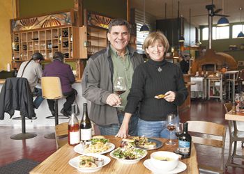 Dave and Deolinda Coelho eat lunch at The Blue Goat, a new restaurant in Amity and a key example of how Amity is revitalizing. Photo by Andrea Johnson.