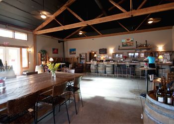 Coelho’s tasting room
and winery used to be an old hardware store. Dave and Deolinda made sure to preserve the beautiful wooden beams and other wood from the property. Photo by Lucas Cook.