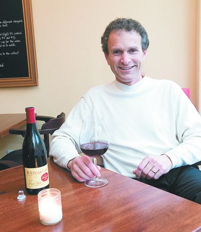 Oregon Wine Board/Oregon Winegrowers Association Executive Director Tom Danowski enjoys a glass of Big Fire Red at R. Stuart & Company’s downtown McMinnville wine bar.