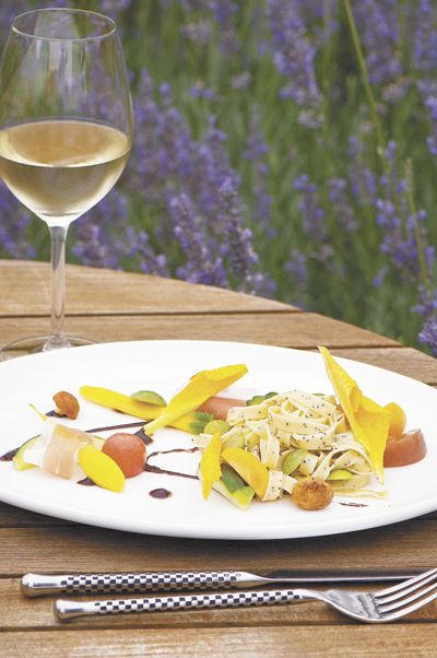 Poppy Seed Fettuccini with Summer Squash,
Castelvetrano Olives, Black Olive Oil, Saffron Butter Emulsion, Chanterelles, Prosciutto and Squash Blossoms. Photo by Andrea Johnson. Poppy Seed Fettuccini with Summer Squash,
Castelvetrano Olives, Black Olive Oil, Saffron Butter Emulsion, Chanterelles, Prosciutto and Squash Blossoms. Photo by Andrea Johnson.
