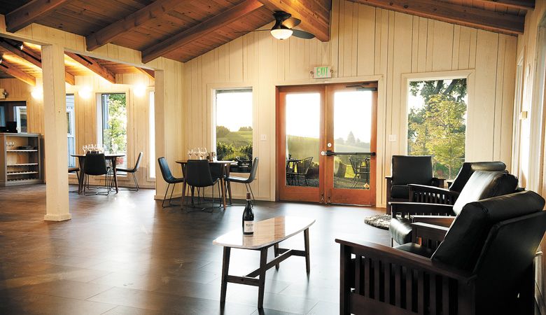 The Outlook at Knudsen Vineyard features a calming interior with large windows and wooden beams.  ##Photo by Kathryn Elsesser