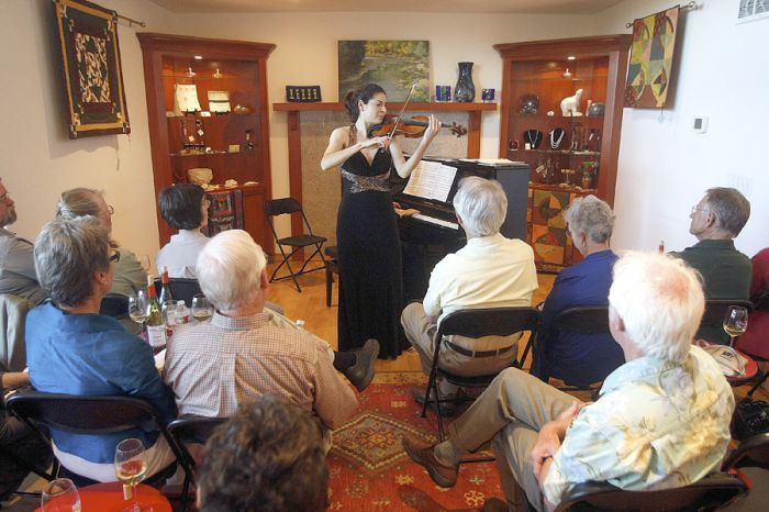 Lindsay Deutsch, a virtuoso violinist, performs on May 31 at MarshAnne Landing. Photo by Mike Sullivan. Lindsay Deutsch, a virtuoso violinist, performs on May 31 at MarshAnne Landing. Photo by Mike Sullivan.