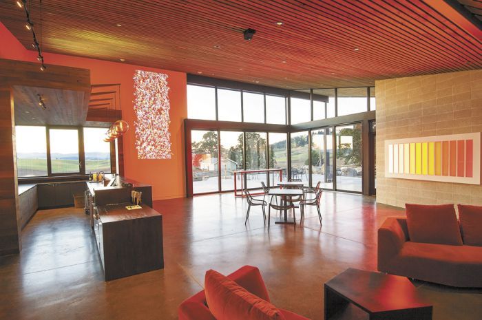 Artwork is displayed throughout the tasting room, including “Coded Spectrum” by Leo Villareal (right wall). Artwork is displayed throughout the tasting room, including “Coded Spectrum” by Leo Villareal (right wall).