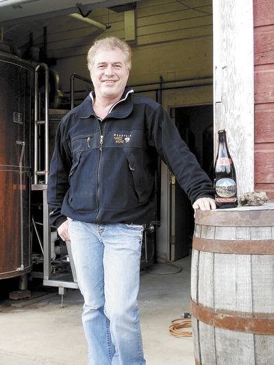 David Logsdon stands in front of his barn, which he turned into a brewery. Logsdon’s farm is near Hood River in the Columbia Gorge.