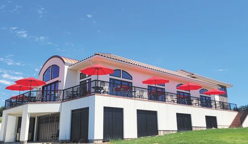 Festive Hill Winery features an expansive outdoor deck and a ballroom-sized hospitality space.  ## Photo provided by Festive Hill Winery