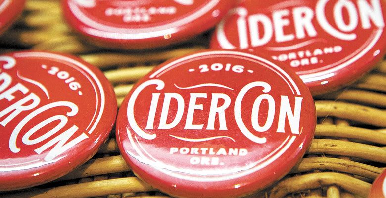 Festival buttons display the vintage-looking logo for the 2016 event. ##Photo by Christine Hyatt.