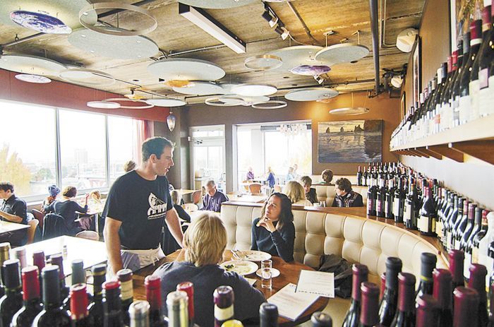 Chef/co-owner Leather Storrs chats with diners at his Southeast Portland wine bar, Noble Rot, which was established in 2002. Photo provided.